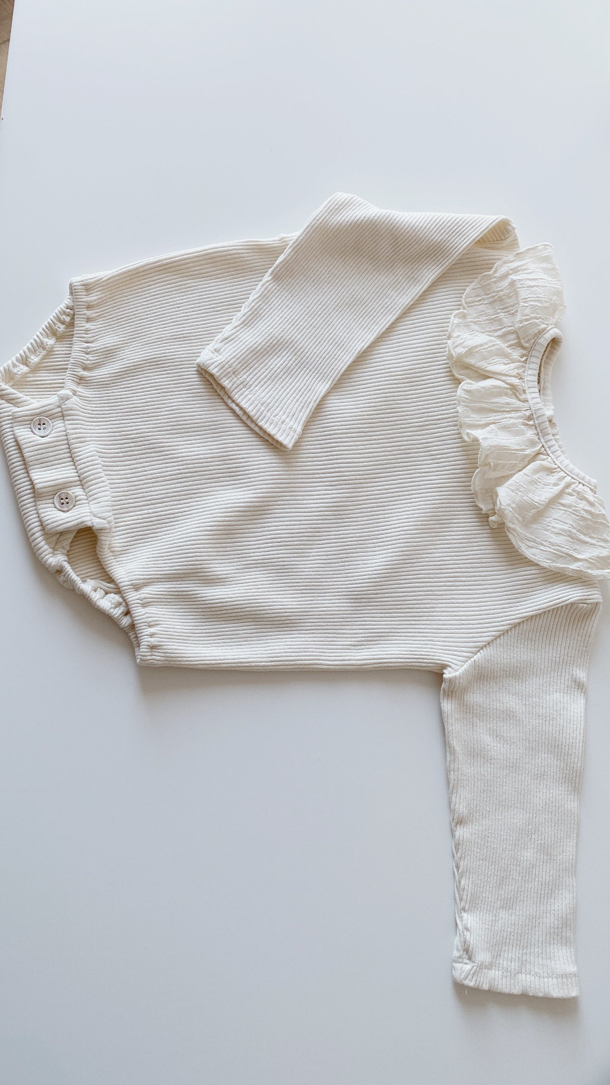 Nora ruffle romper creme